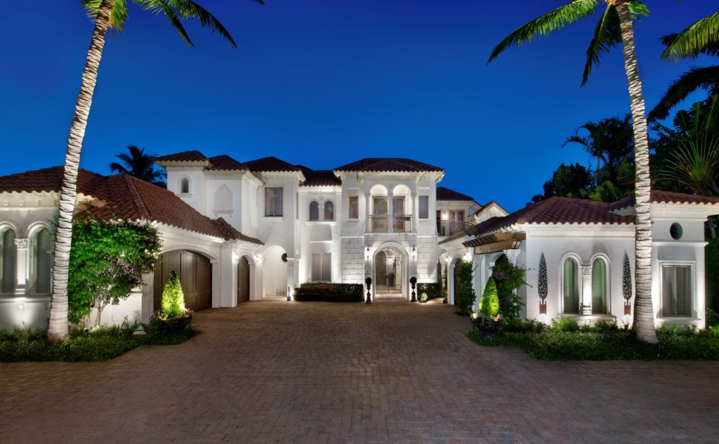 Architectural lighting on Port Royal home in Naples, Florida.