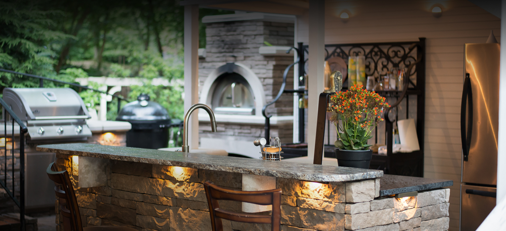 hardscape lighting around outdoor kitchen